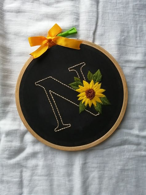 Sunflower embroidered on letter N🌻✨ Letter N Embroidery Pattern, N Letter Embroidery Design, N Embroidery Letter, N Letter Embroidery, Letter N Embroidery, Letter N Craft, Hand Embroidery Letters, Initial Embroidery, Sunflower Embroidery