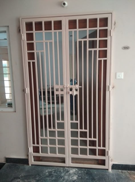 Grill Door Design Front Entry Indian, Ms Safety Door Design, Iron Safety Door Design, Safety Door Design Entrance Modern With Grill, Safety Door Design Entrance Grill, Balcony Safety Grill Design, Main Door Grill, Main Grill Gate Design, Balcony Door Design