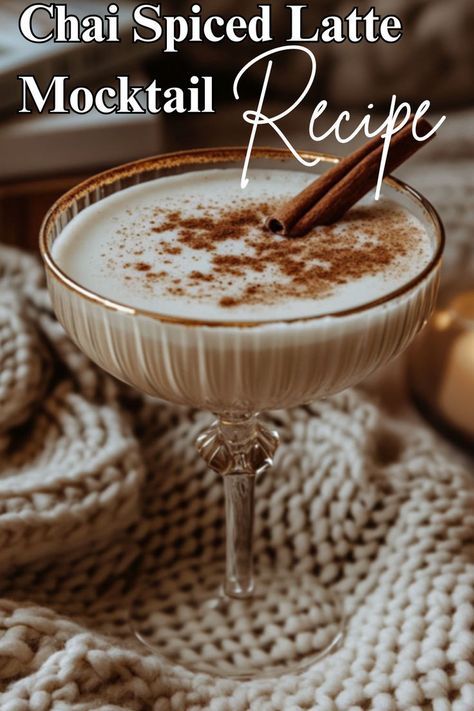 A glass of creamy chai spiced latte mocktail, garnished with a cinnamon stick, sitting on a cozy knit blanket for the perfect winter vibe. Mocktail Ideas, Gingerbread Syrup, Cocktail And Mocktail, Recipes To Try At Home, Spiced Cider, Hot Toddy, Chai Spice, Cozy Meals, Beverage Recipes