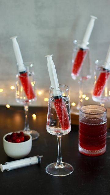 Megan Ruffles on Instagram: "Comment SPOOKY and I’ll send you a direct message with the links to shop and recreate this Halloween party drink!

Simply add Prosecco or sparkling flavored water to a glass then fill each syringe with cranberry juice (my favorite is diet cran raspberry juice).

#halloweencocktail #halloweencocktails #halloweenpartyideas #halloweenpartyfood #halloweenpartydrinks" Halloween Cocktail Party Ideas, Cocktail Party Ideas, Prosecco Drinks, Raspberry Juice, Cranberry Mimosa, Halloween Cocktail Party, Halloween Juice, Halloween Party Drinks, Chef Party