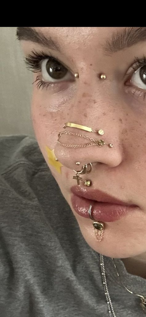 Nose Chain And Septum, Forward Facing Nostril Piercing, Stacked Nose Piercing, Paired Nostril Piercing, High Nose Piercing, Facial Piercing Ideas, Gold Face Piercings, Multiple Nose Piercings, Stretched Labret