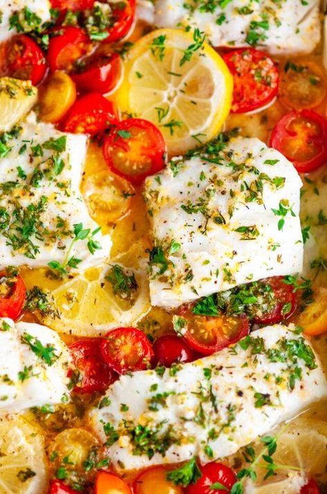 Lemon Herb Butter Baked Cod - Fresh cod fillets baked with cherry tomatoes and smothered in a lemon garlic herb butter sauce. From aberdeenskitchen.com #herb #lemon #butter #cod #baked #fish #seafood #tomatoes #maindish #dinner #recipe #glutenfree Garlic Herb Butter Sauce, Butter Baked Cod, Baked Haddock Recipes, Lemon Herb Butter, Baked Cod Fillets, Herb Butter Sauce, Baked Haddock, Haddock Recipes, Herb Butter Recipe