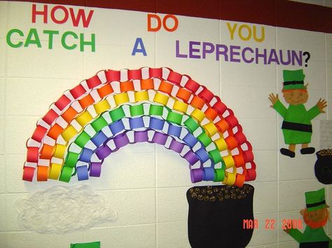 Love how the paper chains make a rainbow! St Patricks day classroom bulletin board with a leprechaun! "How do you catch a leprechaun?" Christmas Decoration For Classroom, Classroom Christmas Door, Christmas Classroom Decorations, Decoration For Classroom, Christmas Door Decoration Ideas, Beautiful Classroom, Classroom Christmas Decorations, Door Decoration Ideas, Christmas Door Decoration