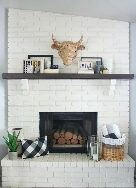 Pull together a look perfect for Fall like this Black & White Mantel Decor by adding fun classic patterns like Plaid, and mixing in lots of great textures. White Mantel Decor, Hearth Decor, Black Mantle, Halloween Mantel Decor, White Brick Fireplace, White Mantel, Cleaning Wood Floors, Halloween Mantel, Fireplace Mantel Decor