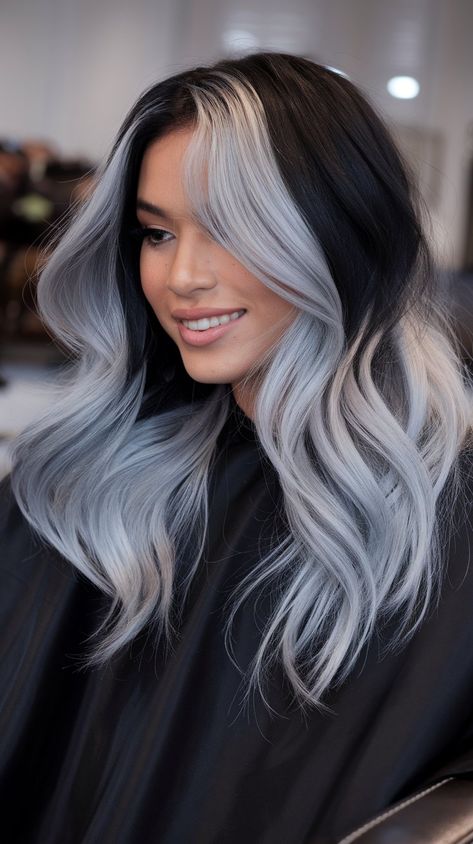 Embrace a sophisticated look with this stunning black to silver ombre hairstyle! The soft waves and striking color transition create a luxurious feel that’s perfect for any occasion. Whether you’re heading to a party or just want to elevate your everyday style, this hairdo is a showstopper! #haircolor #hairstyle #hairinspo #ombrehair #moneypiece #silverhair Blue Black Blonde Hair, White Hair With Black Underneath, Silver Split Dye, Black Hair Silver Money Piece, Gray Silver Hair Color, Black And White Hair Color, Black And White Hairstyles, White Stripe Hair, Black Silver Ombre