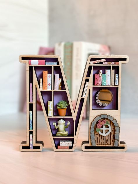 Excited to share this item from my #etsy shop: Mini Bookshelf, 3-D Wood Mini Bookshelf, Letter Bookshelf, Book Lover Gift, Mini Books, Book Lover, Book Lover Wall Decor, Laser Cut #letterbookshelf #bookwalldecor #booklovergift #homedecor #3dbookminibooks #3dbookshelf #teachergift #giftforreader #booklovegift Kids Bookshelf Decor, Book Gifting Ideas, Mini Bookcase Diy, Mini Book Shelf Ideas, Mini Book Library, Mini Bookshelf Diy, Diy Mini Bookshelf, Bookshelves Inspiration, Mini Book Shelf