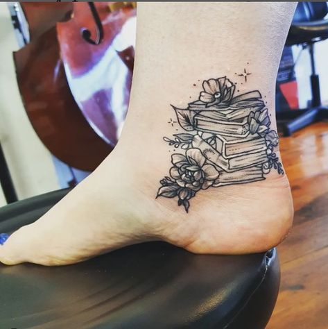 If you enjoy books or are an author and want to express your passion for writing or books, you might get a fantastic pile of books with some beautiful flower tattoos. If you enjoy reading, perhaps a pile of books... Ankle Tattoos, Beautiful Flower Tattoos, Pile Of Books, Enjoy Reading, Book Tattoo, Sunflower Tattoo, Ankle Tattoo, Beautiful Flower, Flower Tattoos