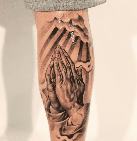 praying hands tattoo | Praying Hands Tattoos for Men - Ideas and Designs for Guys Prayer Hands Tattoo, Praying Hands Tattoo Design, Back Of Leg Tattoos, Praying Hands Tattoo, Best Leg Tattoos, Lower Leg Tattoos, Catrina Tattoo, Hands Tattoo, God Tattoos