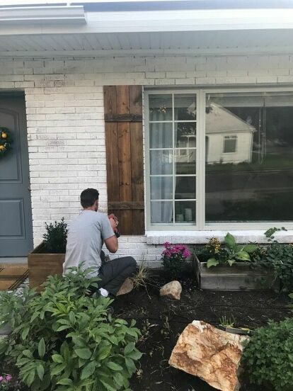 My husband and I looked for different ways to hang our DIY wood shutters onto our brick house, and there were quite a few different options that we came across. It got slightly confusing, so I thought I’d share what we decided to do and what worked for us.I’d like to note that we are not pros, but this is what we found to work for us. We started by holding the shutter up where we were planning to hang it on the house. From there, we marked the shutter where the mortar line on the hou… Diy Wood Shutters, Interior Drawing, Painted Brick House, House Shutters, Diy Shutters, Drawing Eye, Bricks Diy, Brick Ranch, Home Exterior Makeover