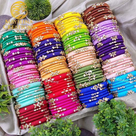 Perfect Return Gifts - Silk Thread Bangles! 🦋 Delight your guests with vibrant, handcrafted silk thread bangles. A unique and memorable return gift for weddings, birthdays, and celebrations! #ReturnGiftIdeas #SilkThreadBangles #handmadejewelry #PartyFavors #IndianTradition . Mayilina Creations Gleam.Glisten.Glow✨ #silkthreadbangles😘 #silk #threadbangles #threadedbangles #silkthread #bangles #silkthreadearrings #silkthreadbangle #hairband #customizedbangles #kundanbangles #bridalbangles #kun... Silk Thread Bangles Design, Silk Bangles, Silk Thread Earrings, Thread Bangles Design, Kundan Bangles, Silk Thread Bangles, Return Gifts, Thread Bangles, Bangles Design