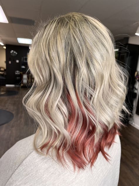 Peakaboo Underlights Rose Gold, Blonde Hair With Different Color Underneath, Blonde Hair With Under Color, Blonde And Maroon Hair Highlights, Red And Ash Blonde Hair, Blonde And Pink Underneath Hair, Blonde Highlights With Pop Of Color, Blonde Hair Copper Underneath, Subtle Pops Of Color In Blonde Hair