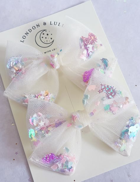 "Our tulle shaker bows, now in a smaller size bow pigtail set!  These pigtail bows coordinate with our Medium size tulle shaker bows.  Small bow pigtail bows are around 3.50\"  Handmade with love and magic in Southern California!  Please note for safety; due to the small pieces inside these delicate tulle bows they are not suitable for kids under the age of 4." Shaker Bows, Tulle Hair Bows, Pony Birthday Party, Diy Earrings Easy, Diy Hair Accessories Ribbon, Kids Hair Clips, Pigtail Bows, Tulle Bow, Pony Birthday