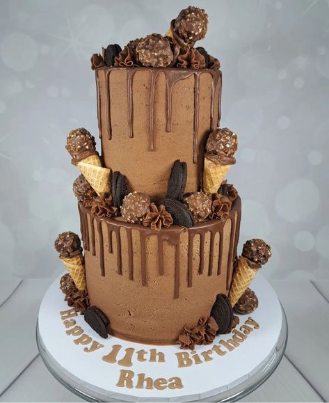 2 tier Chocolate Drip Cake loaded with Ferrero Rocher, Wafer Cones and Oreos Cake 2 Tier, Rocher Cake, Ferrero Rocher Cake, Chocolate Drip Cake, Chocolate Drip, Drip Cake, Ferrero Rocher, Drip Cakes, Oreo