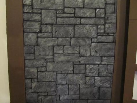 The completed foam wall Diy Stone Wall, Foam Board Crafts, Shrek Jr, Foam Carving, Faux Stone Walls, Faux Brick Walls, Diy Props, Foam Panels, Castle Wall