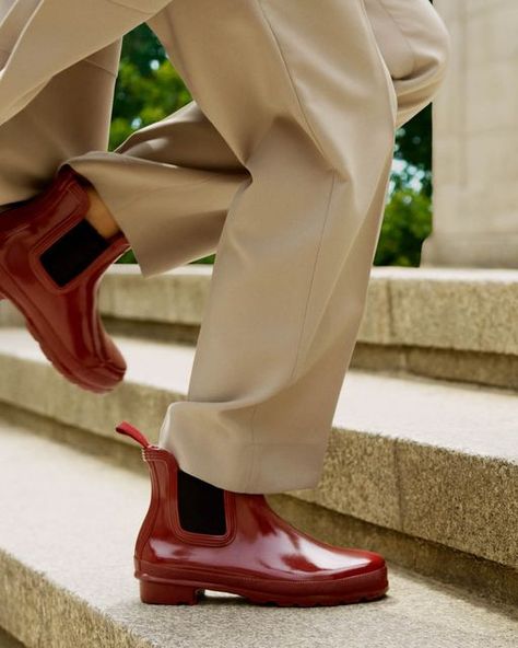 Hunter Boots on Instagram: "Everyday exploration in style on the streets of London – wearing our Original Gloss Chelsea Boots in a new Fall Red colourway.⁣ ⁣ Tap to shop the new season now.⁣ ⁣ #HunterOriginals" Hunter Boot, Streets Of London, London Street, Skirt Socks, Blouse Outfit, Romper Pants, Hunter Boots, Cardigan Coat, The Streets