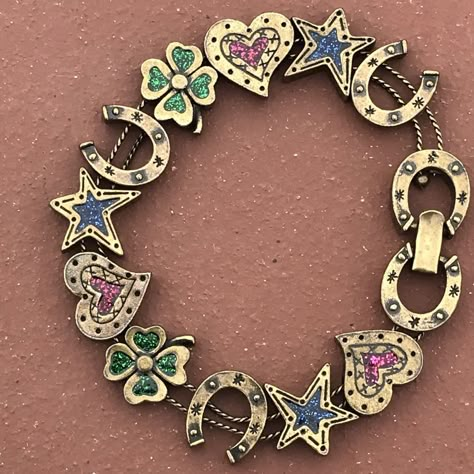 Vintage Avon Panel Bracelet Heart Clover Horseshoe Brass Tone  | eBay Vintage Jewelry Photography, 90s Accessories Jewelry, Early 2000s Jewelry, 80s Jewelry, Eclectic Jewelry, Quirky Jewelry, Bracelet Heart, Snap Lock, Dope Jewelry