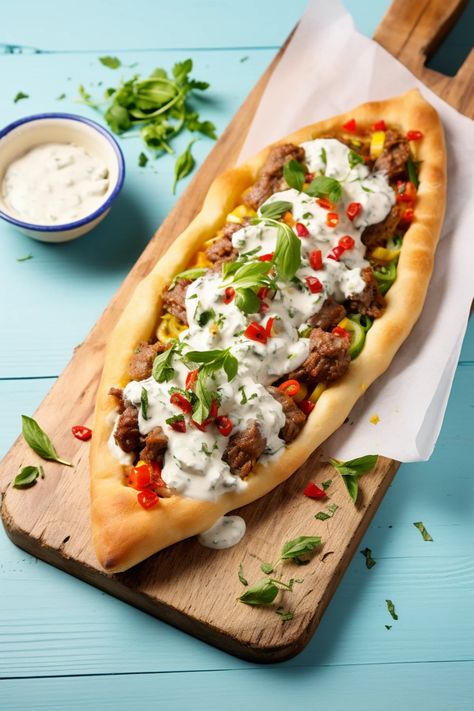 Turkish Pide with Spicy Lamb and Feta, Drizzled with Yogurt Sauce - Cooking Mediterranean Turkish Street Food Recipes, Turkish Dinner, Turkish Street Food, Turkish Recipe, Turkish Pide, Royal Feast, Turkish Spices, Open Sandwich, Olive Sauce