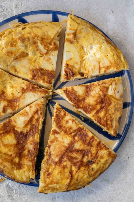 Spanish Tortilla Spanish Tortilla Recipe, Breakfast Tortilla, Spanish Tortilla, Spanish Omelette, Tapas Dishes, Lemon Potatoes, Omelette Recipe, Pork Cutlets, Spanish Dishes