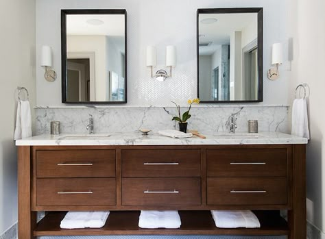 Wanted you to comment on the dark cabinets with the herringbone chevron tile backsplash up the wall. White Herringbone Tile Backsplash, White Herringbone Tile, Herringbone Tile Backsplash, Vanity Backsplash, Double Shower, Wood Bathroom Vanity, Transitional Bathroom, Stunning Bathrooms, Bathroom Backsplash