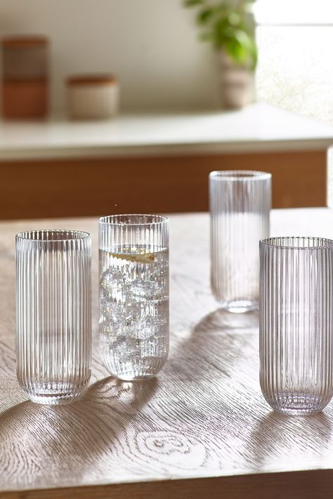 Elevate your glassware collection with this set of 4 Hollis optic tall tumblers. Crafted with sleek and precise optic, these tumblers seamlessly blend contemporary design with functional elegance. Perfect for serving up everyday refreshments. Dishwasher safe. 100% Glass. Kitchen Decor Collections, Antique Dishes, Future Apartment Decor, Kitchen Accessories Decor, Apartment Plans, House Design Kitchen, Glassware Collection, Cute Kitchen, Dream House Interior