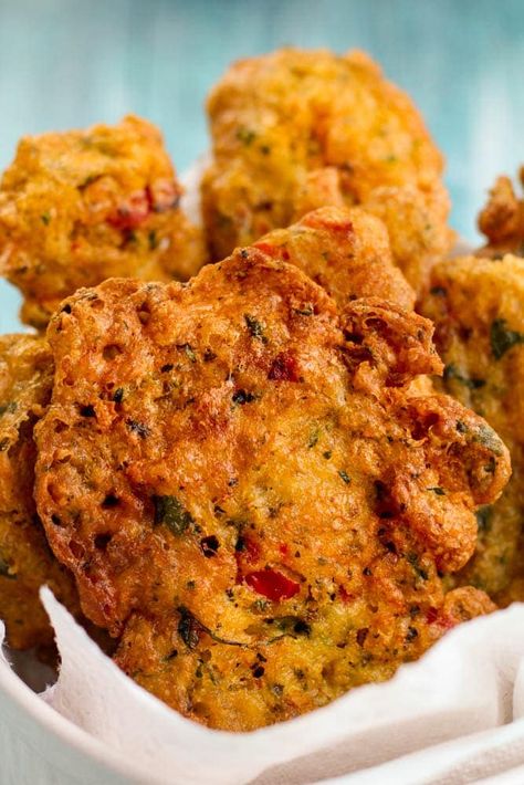 A Latin codfish fritter, this flavorful finger food is perfect for gatherings and is completely flavorful and seafood lover approved. Bacalaitos Recipe, Codfish Fritters, Mom Meals, Recetas Puertorriqueñas, Spanish Appetizers, Puerto Rican Cuisine, Puerto Rico Food, Boricua Recipes, Spanish Dishes