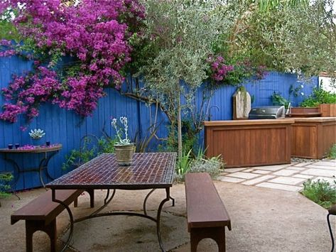 <p>Los Angeles-based landscape designer Laura Morton transforms an unsightly driveway lined with pool equipment into a magical dining terrace & outdoor kitchen at this 1934 Spanish Colonial Revival home in West Hollywood. View the photo slideshow or <a href="/los-angeles/hollywood-kitchen.html" target="_self">click here</a> to read the full story.</p> Blue Fence, Spiritual Garden, Spanish Colonial Homes, Sacred Garden, Garden Retreat, Zen Gardens, Mediterranean Plants, California Garden, Sacred Spaces