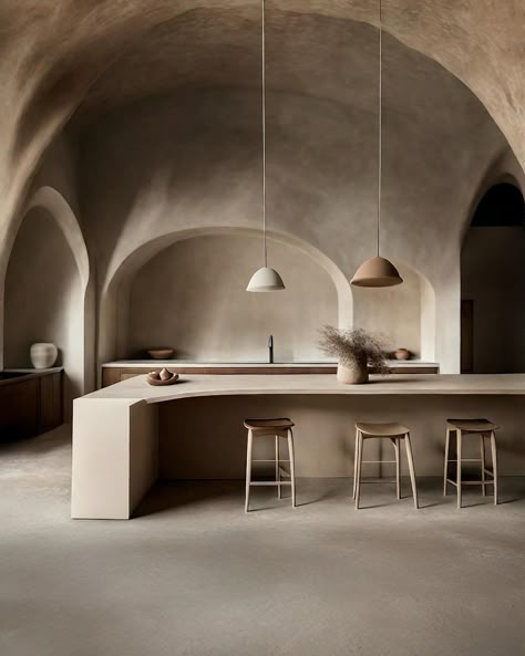 Minimalistic Dream Home in calming earth tones. Soothing beige lime wash walls, accentuated by the gentle curves of round arches. Stone and wood furniture add warmth and texture, embodying the essence of modern rustic charm. Which room is your favorite? 💖 #wabisabi #japandi #wabisabiinteriors #japandiinterior #aidesign #organicmodern #interiordesign #limewash La Canche, Lime Wash Walls, New Mediterranean, Mediterranean Kitchen Design, Contemporary Kitchen Decor, Mediterranean Interior Design, Japandi Interiors, Lime Wash, Japandi Home