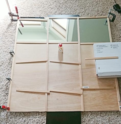 cut molding pieces and begin gluing Diy Grid Mirror, Home Gym Mirror, Grid Mirror, Home Gym Mirrors, Gym Mirror, Huge Mirror, Gym Mirrors, Picture Wire, Wooden Screen