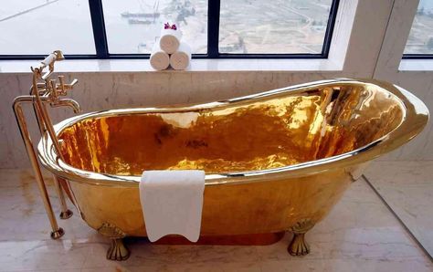 This Vietnamese hotel boasts a President Suite with a gold bathtub and sinks! - Gold Bathtub, Italian Bathroom, Presidential Suite, Vintage Bathtub, Bali House, Penthouse Suite, Resort Design, Gold Kitchen, Gold Bathroom