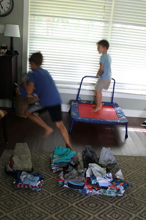 The other day I was pulling a large load of laundry out of the dryer at the same time my boys began to argue about whose turn it was to get to jump on our small indoor trampoline. As the fussing escalated along with my blood pressure, I got an idea! Holding the big basket … Game Loading, Game For Boys, Happy Home Fairy, Indoor Trampoline, Big Basket, Games For Boys, How To Get Clients, Happy Home, Photo To Video