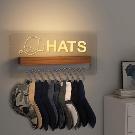 PRICES MAY VARY. Aesthetically Pleasing and Practical: Made with acrylic and wood materials, this hat organizer is both durable and stylish. It not only stores your hats, but adds a sleek and modern look to your home LED Lighting: This hat organizer features warm white LED lighting that adds a cozy and inviting ambiance to any space. The gentle glow makes finding your favorite hat a breeze USB Powered: This hat organizer comes with a USB data cable, making it easy to power and use wherever you n Baseball Hat Display, Baseball Hat Storage, Basketball Room Decor, Baseball Hat Racks, Pantry Closet Design, Light Up Hats, Basketball Room, Cap Rack, Hat Organizer