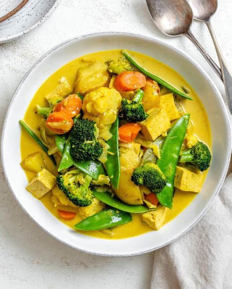 This Easy Tofu Vegetable Coconut Curry is perfect for curry lovers! It's wholesome, super nutritious, and ready in just 30 minutes! #plantbasedonabudget #coconut #curry #vegan Tofu Coconut Curry, Indian Coconut Curry, Vegan Coconut Curry, Curry With Tofu, Yellow Curry Recipe, Coconut Curry Recipe, Coconut Curry Recipes, Indian Vegan, Vegan Curry Recipes