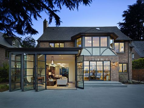 Classic tudor house in Seattle with a modern renovation for book lovers Classic Seattle Lakefront House gets a Bookish Modern Twist! Architecture Unique, Historic Renovation, Modern Renovation, Seattle Homes, Tudor Style Homes, Door Frames, Steel Windows, Lakefront Homes, Tudor House