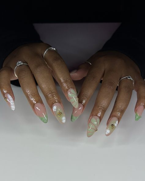 🌿🐚🥝 @shopagaloreco products used: *bling gel *irish creme *sativa, sage, ultra white *bling gel *diamond steel top coat use code ‘ALEXIA10’ at checkout 🤎 #nails #nailart #naildesign #nailideas #nailinspo #greennails #bloomingnails #3dnailart #3dnails #gelx #gelxnails #gelxinspo #gelxnailtech #cltnails #cltnailtech Lilac And Sage Nails, Olive Green And White Nails, Sage Green Marble Nails, Sage Nails Acrylic, Fall Nails Olive Green, Jade Green Nails Acrylic, White And Green Nails, Sage Green Nail Designs, Gold Foil Nail