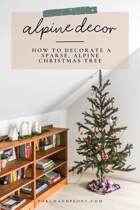 From the history of Christmas trees to the best formula to decorate a sparse alpine Christmas tree, check out this post for all the ways for decorating your sparse tree this Christmas! | Alpine Christmas Decor | Alpine Christmas Tree | Alpine Christmas Tree Ideas | Sparse Christmas Tree | Sparse Christmas Tree Decorations | Sparse Christmas Tree Decorating | Sparse Christmas Tree Ideas | Sparse Tree Decorating | Christmas Tree Ideas | Christmas Tree Decorations | Christmas Tree Original Decor Alpine Christmas Tree Ideas Decor, Alpine Fir Christmas Tree, Sparse Christmas Tree Decorated, Decorating A Sparse Christmas Tree, Alpine Tree Decor Ideas, Sparse Christmas Tree Ideas, Alpine Christmas Tree Ideas, How To Decorate A Sparse Christmas Tree, Decorating Christmas Tree Ideas