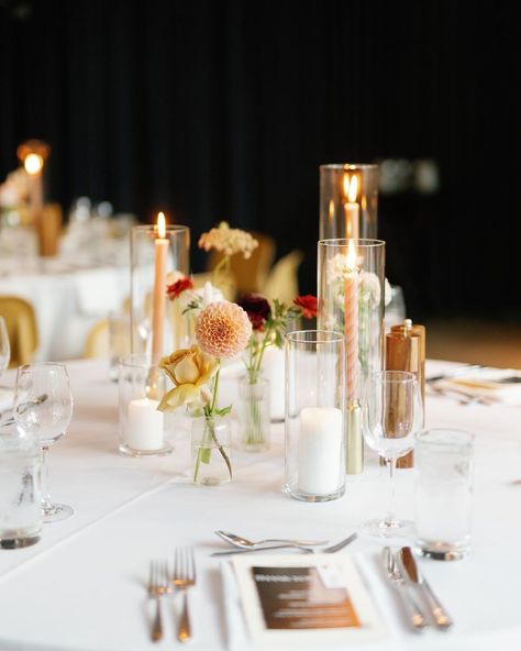 The Farmer & I | Carrington W. on Instagram: “I love the simplicity of some bud vases + taper candles🫶🏻 and the twirly candlesticks ugh I love. captured by @bradybatesphotography for…” Bud Vases Pillar Candles, Mismatched Candles Wedding, Bud Vases And Votives Wedding Centerpiece, Bud Vases And Tall Candles, Mix Of Pillar And Taper Candles Wedding, Taper Candles In Glass Cylinders, Taper Candle Wedding Centerpieces, Pillar Candles And Bud Vases, Bud Case And Candle Centerpiece