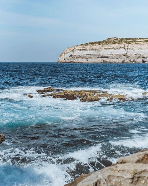 Nature’s beauty on Gozo Island  The rugged beauty of Gozo Island never ceases to amaze me. Watching the waves crash against these ancient rocks was so beautiful —powerful, relentless and utterly mesmerizing. Gozo may be smaller than Malta, but its dramatic coastlines and hidden gems like this beach make it feel like a world of its own. If you're ever looking for a place where the sea and land collide in the most spectacular way, Gozo is it. Have you explored the Maltese islands? Gozo Island, Maltese Islands, Instagram Travel, Travel Instagram, Hidden Gems, Maltese, Malta, The Sea, Travel Tips