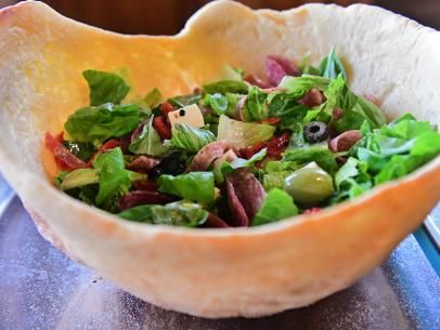 Pizza Dough Salad Bowl Recipe | Ree Drummond | Food Network Food Network Recipes Pioneer Woman, Salad Bowl Recipes, Pizza Bowl, Pizza Salad, Pizza Dough Recipe, Bread Bowl, Bowl Food, Ree Drummond, Bread Bowls