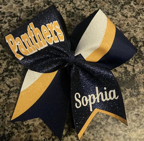 Yellow gold and custom cheer bow. Swish design. Great Gameday cheer bow, competition cheer bow, sideline cheer bow, bulk bows for your squad by lovelydesignsbyL on Etsy Cheer Bow Ideas, Competition Cheer, Competition Bows, Sideline Cheer, Logo Message, Custom Cheer Bows, Glitter Heat Transfer Vinyl, Competitive Cheer, Cheer Bow