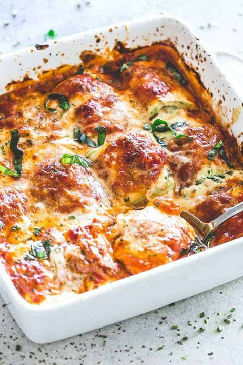 This easy zucchini lasagna recipe is a family favorite! Zucchini slices rolled around a delicious ricotta filling, baked in sauce & topped with cheese. #zucchini #lasagna #lowcarb #dinner Zucchini Lasagna Roll Ups, Keto Lasagne, Zucchini Roll Ups, Lasagne Roll Ups, Zucchini Roll, Low Carb Zucchini Lasagna, Cheese Zucchini, Zucchini Lasagna Rolls, Zucchini Lasagne