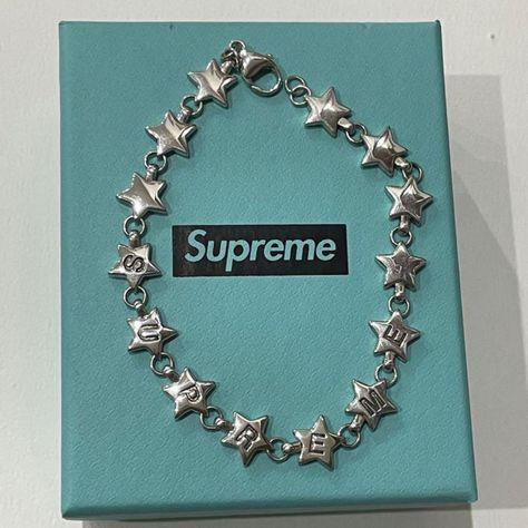 Description Tiffany supreme collaboration bracelet　NEW with box rare 2021 star silver New, with box All my products are 100% Authentic. Please feel free to contact us if you have any question.    Shipping We ship using FedEx, DHL and Japan Post.    Payment We usually ship within 3 business days of receiving cleared payment.    International Buyers - Please Note: Import duties, taxes and charges are not included in the item price or shipping charges.These charges are the buyer’s responsibility.Pl Jewelry Collection Silver, Luxury Gifts For Boyfriend, Supreme Tiffany, Supreme Collaboration, Star Beaded Bracelet, Tiffany And Co Bracelet, Tiffany Bracelets, Star Silver, Y2k Jewelry