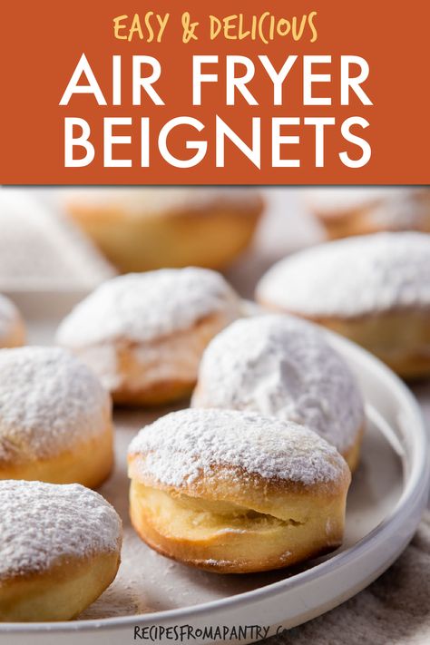 This recipe for Air Fryer Beignets gives you delectable beignets that are crispy on the outside and light and fluffy on the inside. Making beignets in air fryer means you can enjoy the delicious classic New Orleans style pastry without the added oil and calories of the traditional deep fried version. A perfect Sunday morning treat, you'll love how easy it is to make homemade air fryer beignets. Click through to get this awesome Air Fryer beignets recipe!! #airfryer #beignets #homemadebeignets Air Fryer Binet, Air Fryer Cronuts Recipes, Beignets In Air Fryer, Biscuit Beignets Air Fryer, Air Fryer Beniegts, Air Fried Beignets, Air Fryer Beniegts Recipe, Zeppoli Recipe Air Fryer, Air Fryer Beignets Easy