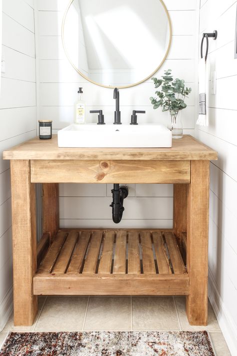 Modern farmhouse bathroom with DIY custom sink and planked walls. #modernfarmhouse #halfbath #powderbath #fixerupperstyle #roundmirror Half Bath Update, Modern Farmhouse Half Bath, Farmhouse Half Bath, Diy Sink, Planked Walls, Makeover Kamar Mandi, Farmhouse Bathroom Sink, Minimalist Birthday, Diy Bathroom Vanity