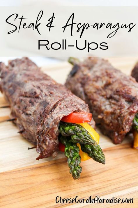 Skirt steak rolled around asparagus and peppers. Asparagus Wrapped In Steak, Flank Steak Wrapped Asparagus, Steak Asparagus Roll Ups, Skirt Steak Roll Ups, Beef Wrapped Asparagus, Steak Wrapped Veggies, Steak Wrapped Asparagus, Balsamic Steak Rolls, Steak And Asparagus