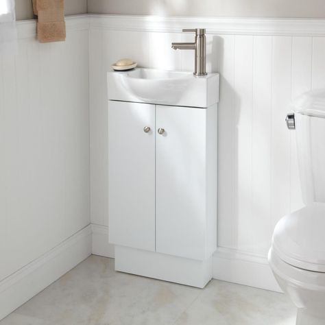 Small Bathroom Vanities and Sinks for Tiny Spaces | Apartment Therapy Small Sink Vanity, Small Bathroom Sink Vanity, Small Vanity Sink, Tiny Bathroom Vanity, Tiny Bathroom Sink, Small Bathroom Cabinets, Small Bathroom Sinks, Bathroom Sink Cabinets, Narrow Bathroom