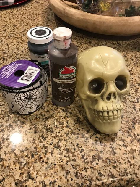 How To Make A Plastic Skull Look Real, Dollar Tree Plastic Skull Crafts, Plastic Skull Makeover, Painting Skull Ideas, Dollar Store Skull Makeover, Plastic Skull Ideas, Plastic Skull Crafts, Dollar Tree Skull Crafts, Halloween Centerpiece Ideas Table