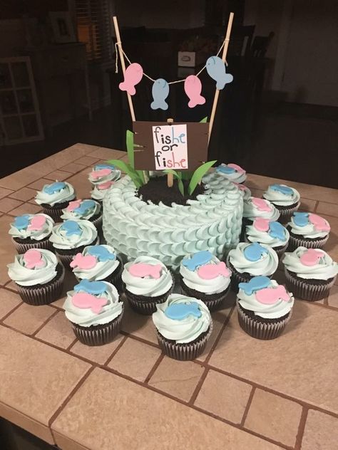 Gender Reveal cake with fish cupcakes Fishing Gender Reveal Ideas Unique, Cute Gender Reveal Ideas Fishing, Fish Gender Reveal Cake, Ice Fishing Gender Reveal, Fish Themed Gender Reveal Ideas, Fishing Gender Reveal Cake, Fish She Or Fish He Gender Reveal, Fishe Or Fishe Gender Reveal Cake, Fishe Or Fishe Gender Reveal Ideas