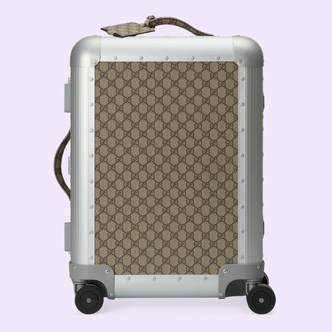 Shop the Aluminum GG cabin trolley at GUCCI.COM. Enjoy Free Shipping and Complimentary Gift Wrapping. Gucci Luggage, Gucci Travel, Savoy Hotel, Luxury Luggage, Hotel In London, Designer Luggage, Cabin Bag, Gucci Tote Bag, Guccio Gucci