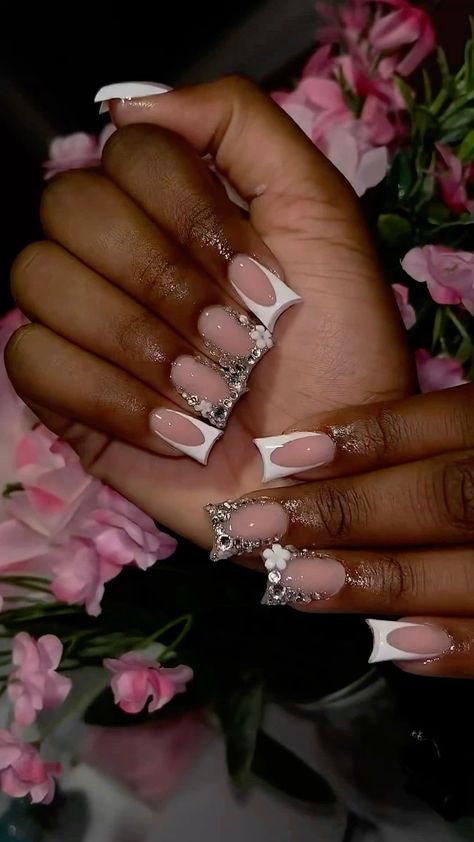 There's a new beauty trend taking over Instagram and it's absolutely stunning. Say hello to "quartz nails". Frenchie Nails With Rhinestones, Short White Nails With Charms, Birthday Junk Nails, Junk French Tip Nails, White French Tip Nails With Charms, Short Heels For Prom, French Nails With Charms, Flower Charm Nails, Short Blinged Out Nails