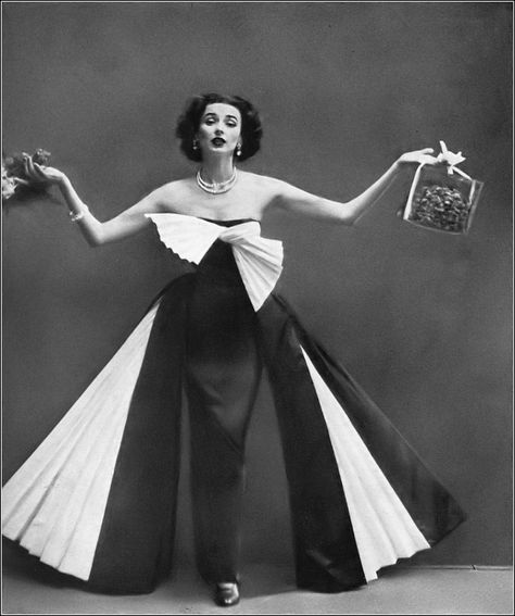 Dorian Leigh in navy blue satin gown, shiny white pleated linen lining the side panels, knotted at the bodice by Jacques Fath, photo by Richard Avedon,, Harper's Bazaar, March 1951 Blue Satin Gown, Dorian Leigh, Jacques Fath, Fashion Silhouette, Fashion D, Richard Avedon, Fashion 1950s, Vintage Fashion Photography, Old Dresses